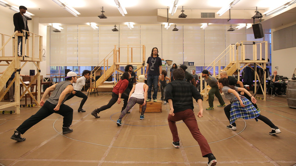 Lin Manuel-Miranda and the cast of Hamilton rehearse a scene at New 42 Studios.